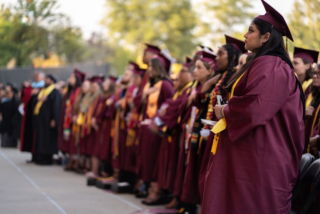Victor Valley College graduate celebrating at commencement