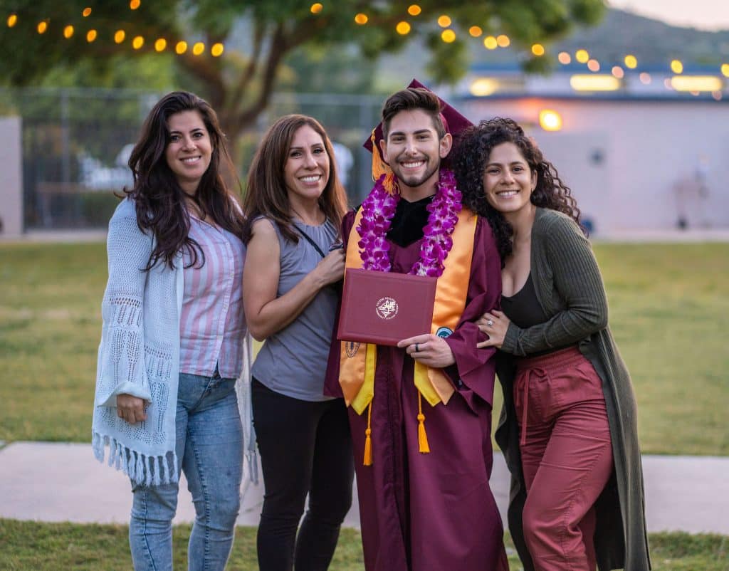 Victor Valley College graduate celebrating at commencement