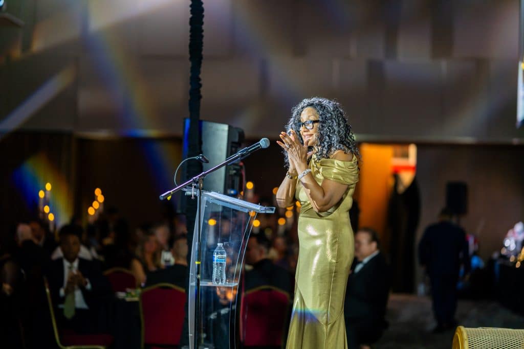 A speaker at the podium during a Victor Valley College Foundation Alumni Hall of Fame and Distinguished Service Awards celebration