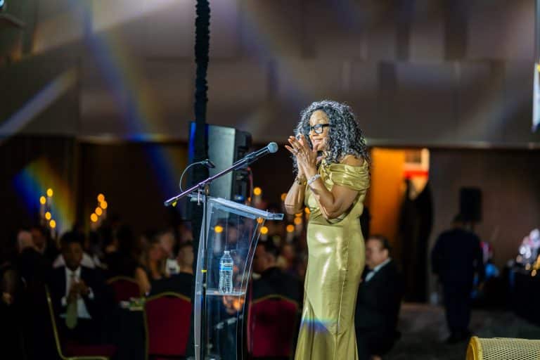 A speaker at the podium during a Victor Valley College Foundation Alumni Hall of Fame and Distinguished Service Awards celebration